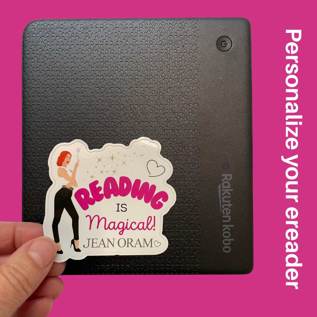 Black e-reader with a 'Reading is Magical' sticker.