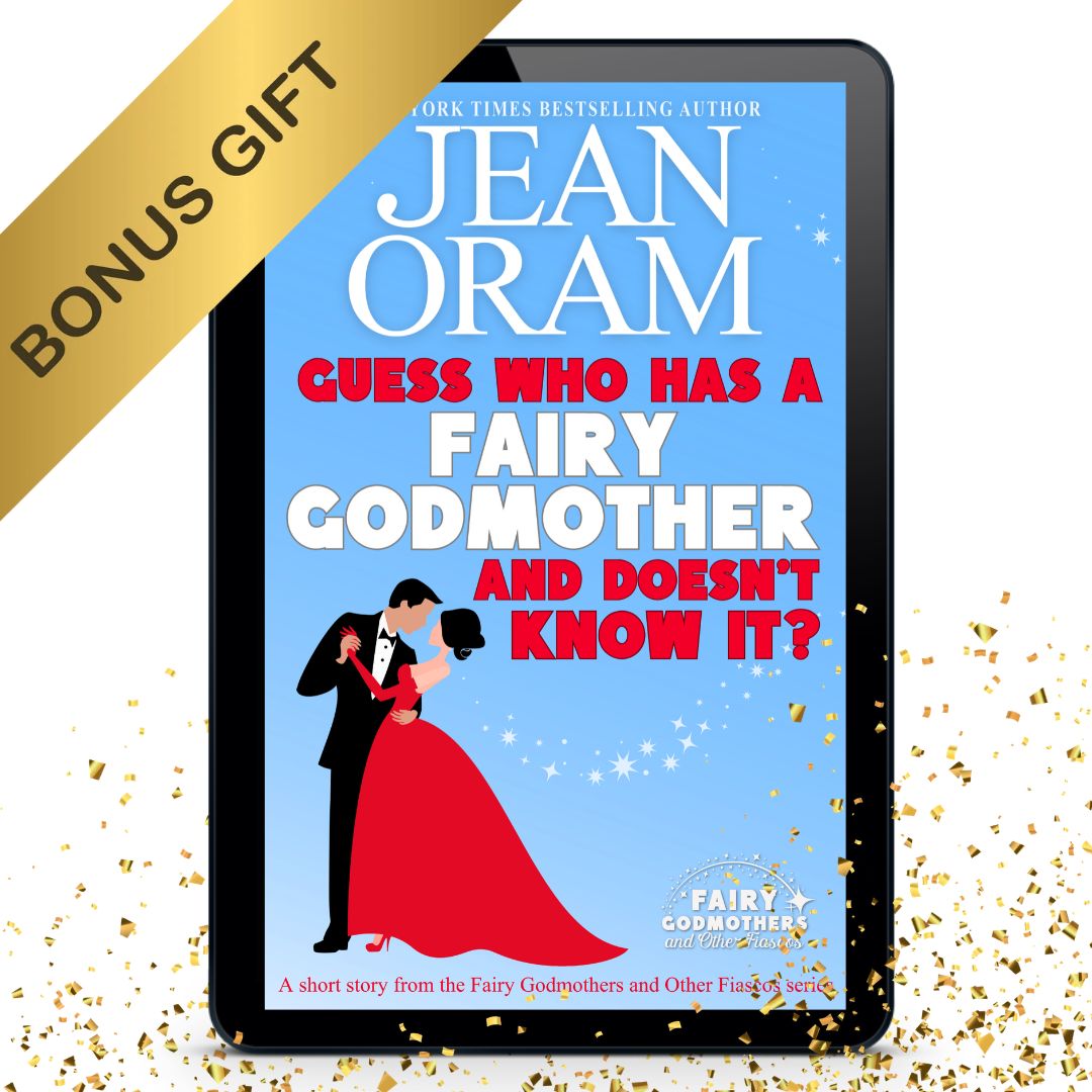 A tablet displaying the book cover of 'Guess Who Has a Fairy Godmother and Doesn't Know It?' by Jean Oram, with a gold 'BONUS GIFT' banner on the top left and gold confetti scattered around on a white background.